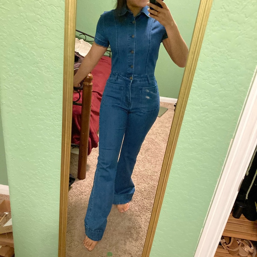 Bell bottom jean jumpsuit